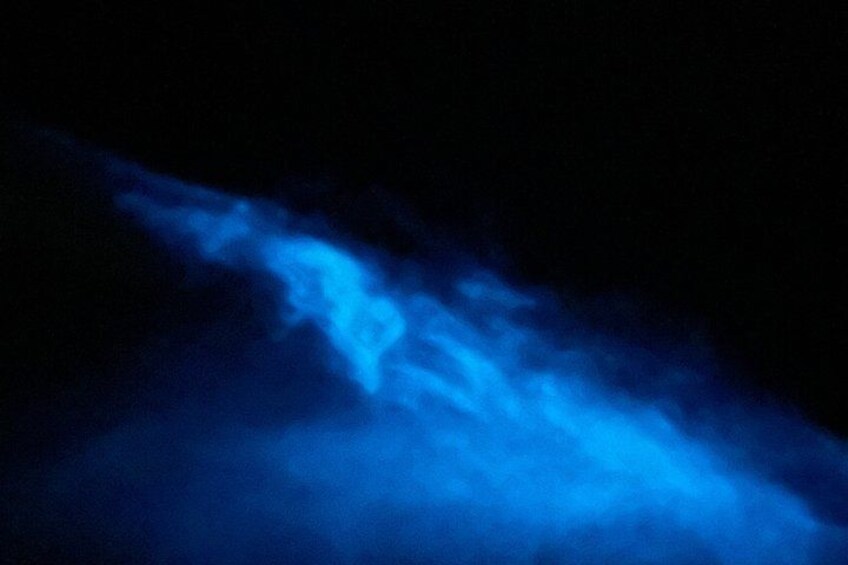 A blue light display against a dark background. 2