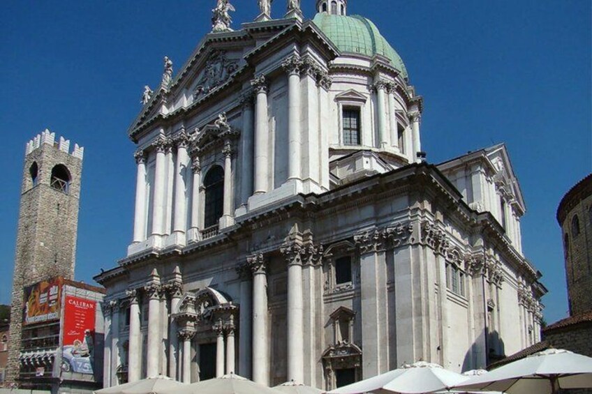 A historic building with a dome and a tower. 4