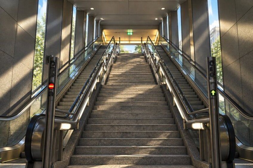 A set of outdoor stairs with handrails, leading up to a building entrance. 3
