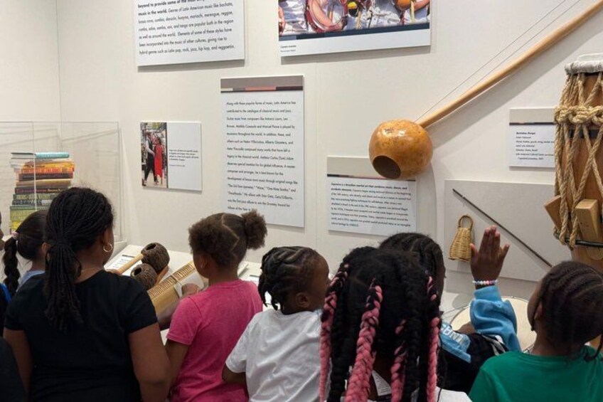 A museum exhibit with educational posters and artifacts. 2