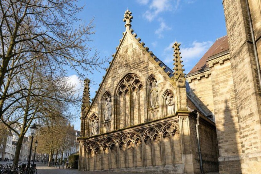 A historic church with pointed arches and detailed stonework. 4