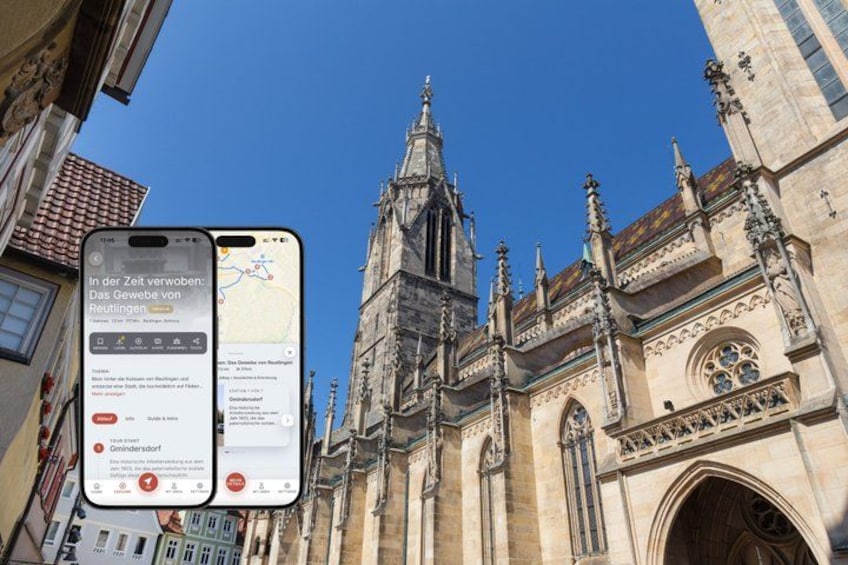 A historic building with Gothic architecture, a smartphone displaying a map, and a clear blue sky. 1