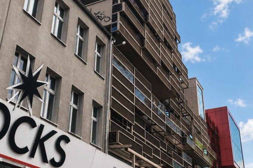 A multi-story building with a star-shaped sign and the word 'ROCKS' on the side. 4