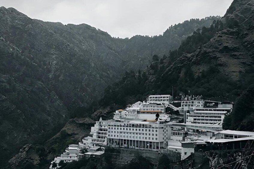 A monastery complex nestled in a mountainous valley. 2