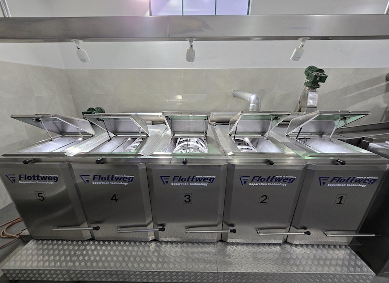 A Flottweg Separation Technology machine with five numbered compartments. 4