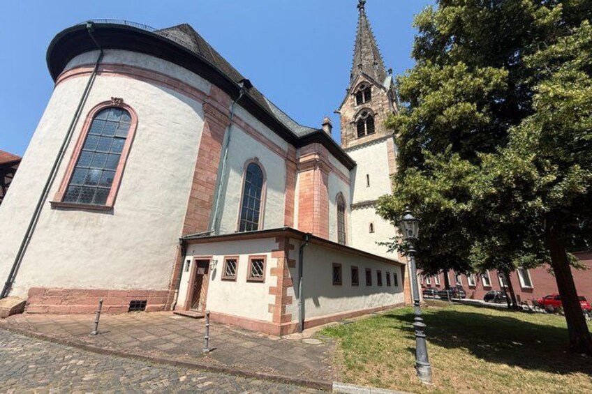A church with a tall steeple and a clock tower. 4