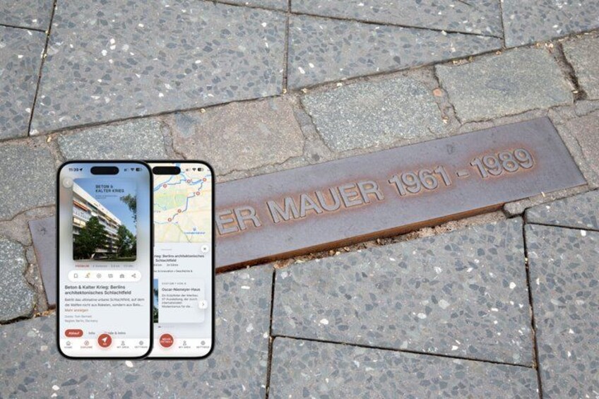 A smartphone displaying a map and a plaque with the inscription 'BER Mauer 1961-1989'. 1