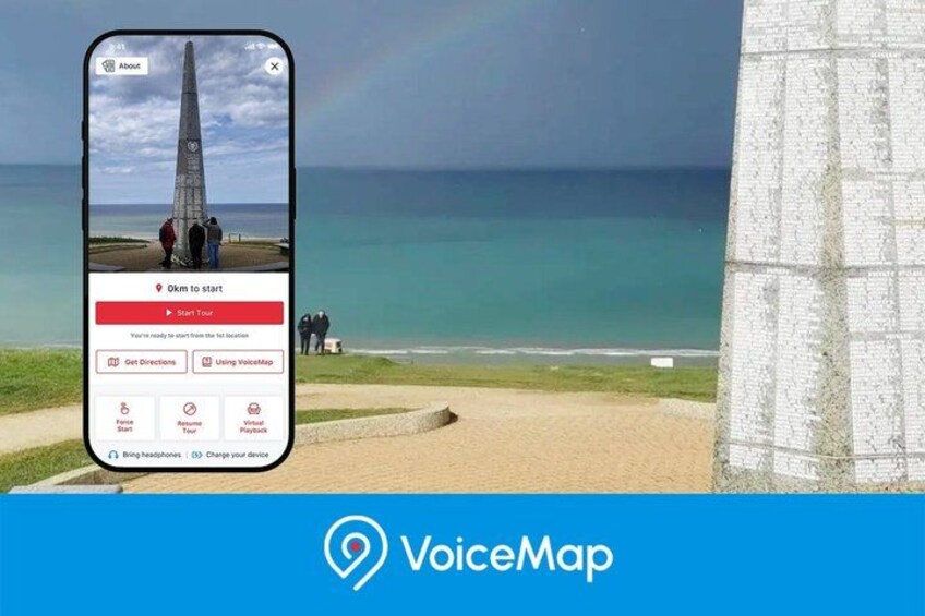 A smartphone displaying a tour app with a coastal scene in the background. 1