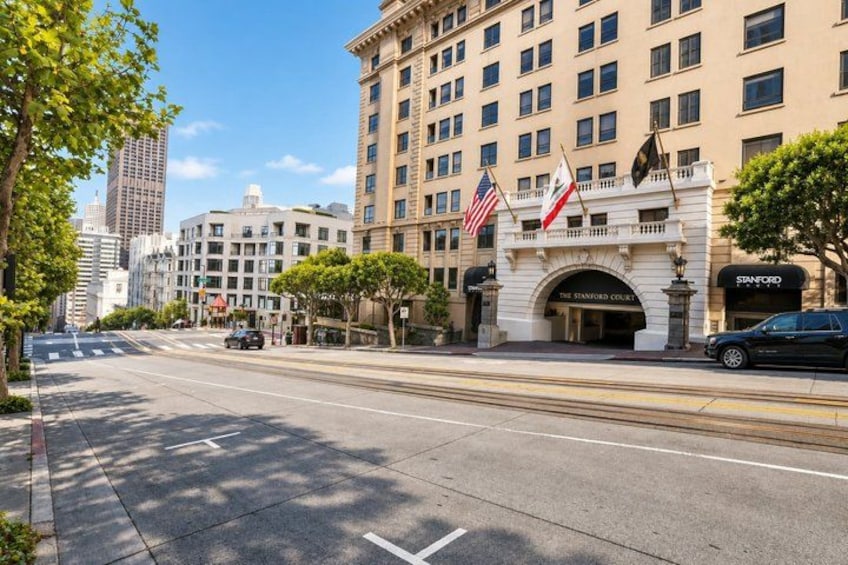 A street with a building labeled 'The Stanford Court' and a 'STANFORD' sign. 4