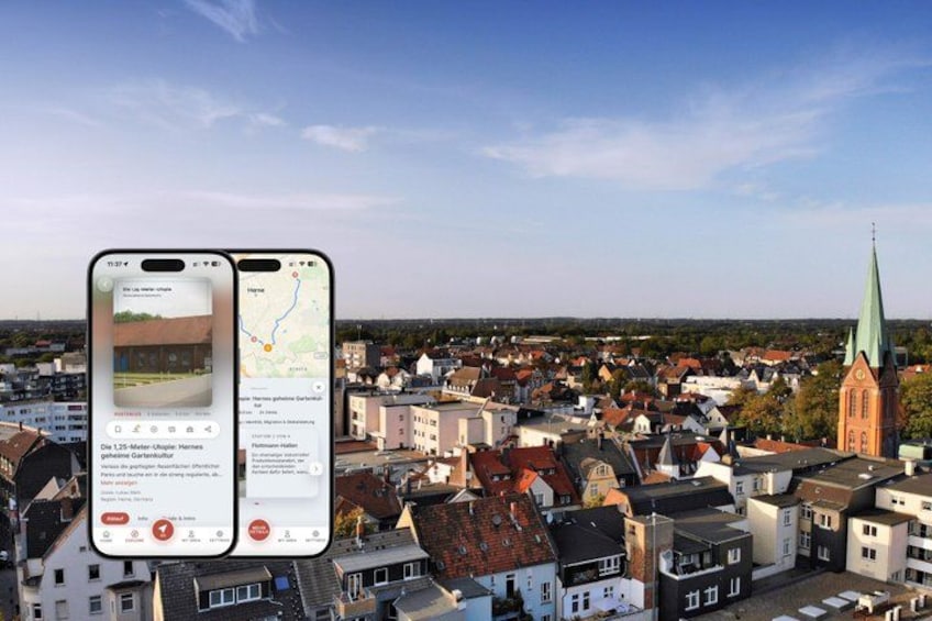 A smartphone displaying a map of a town with a prominent church spire in the background. 1