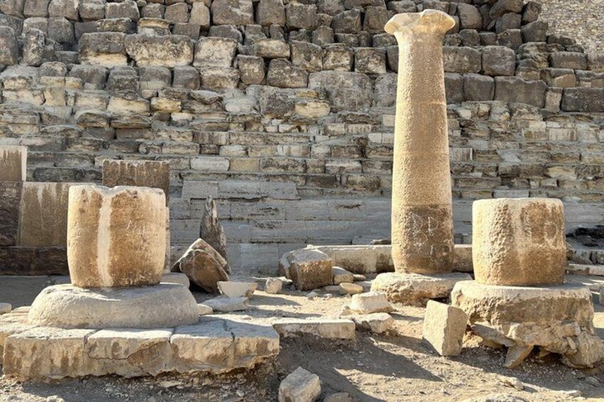 Ancient stone ruins with columns and broken stone blocks. 5