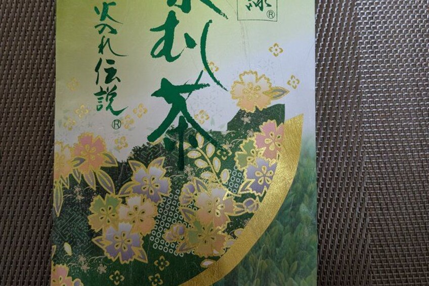 A package with Japanese characters and floral designs. 4