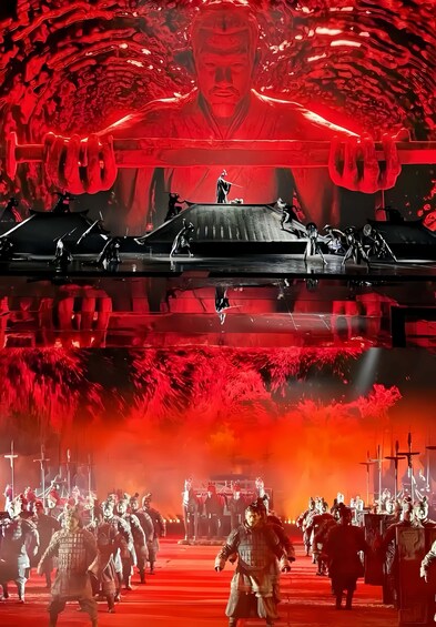 A red-lit tunnel with a large figure at the end. 5