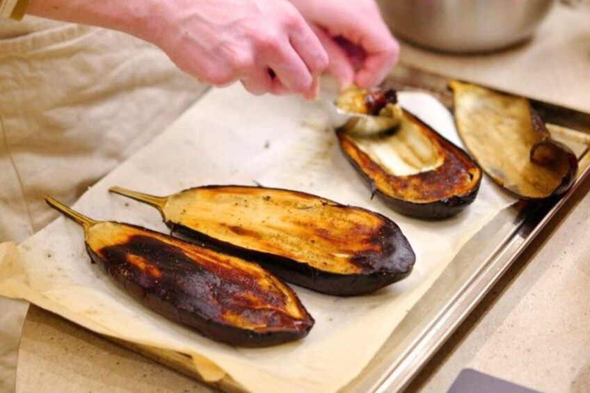 Roasted eggplants on a baking sheet. 5