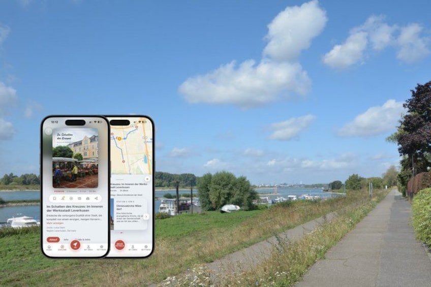 A smartphone displaying a map and a scenic view of a river with boats, a path, and a clear sky. 1