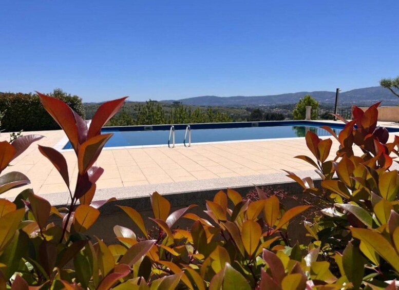 A swimming pool with a view of mountains. 3