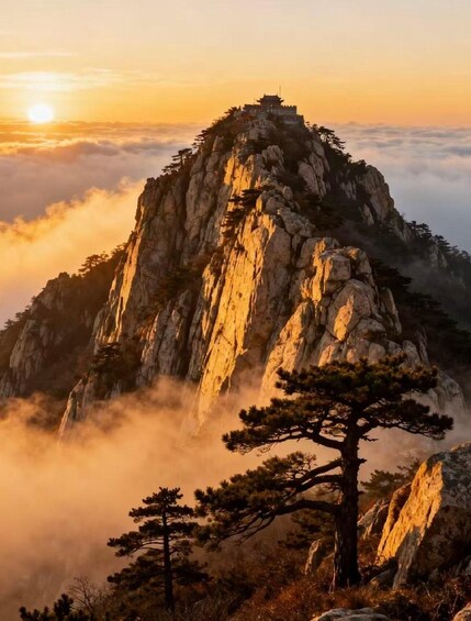 A mountain peak with a temple on top, surrounded by clouds and trees. 3