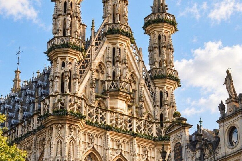 A Gothic-style cathedral with intricate spires and statues. 2