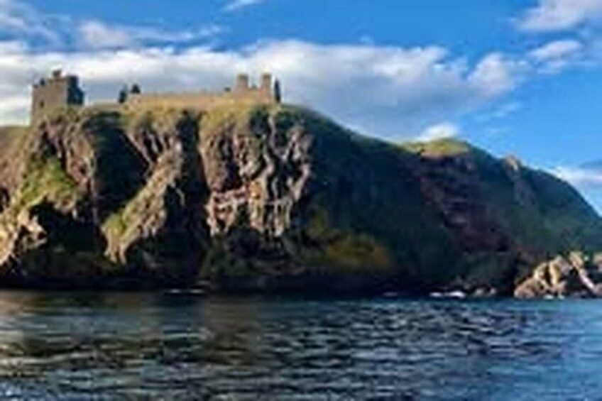 A coastal castle on a rocky outcrop. 1
