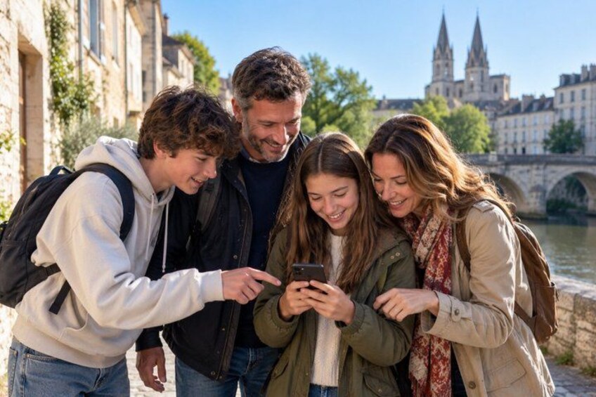 A group of people looking at a smartphone, standing on a stone bridge with buildings and a river in the background. 5