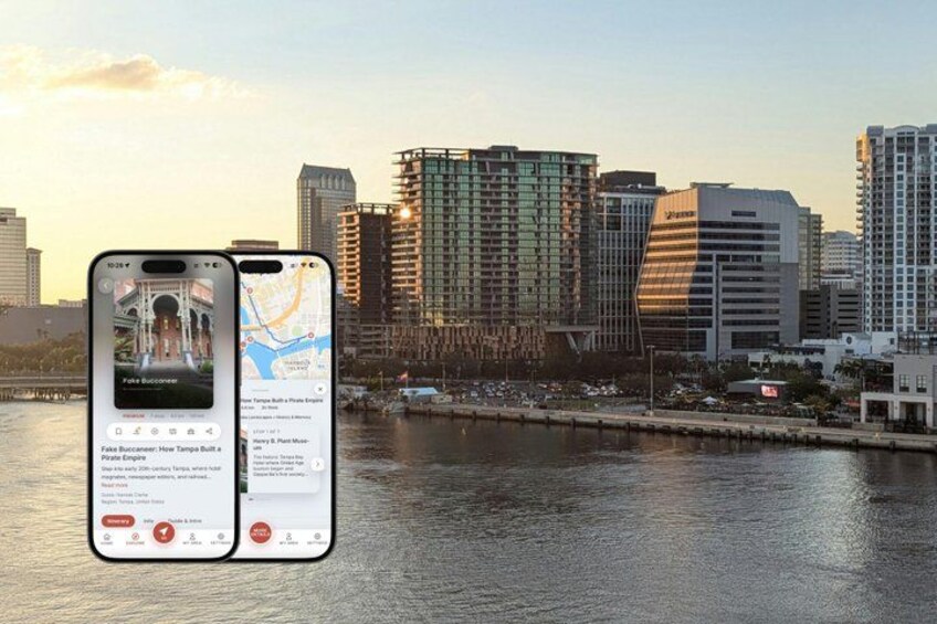 A cityscape with tall buildings and a waterfront. 2