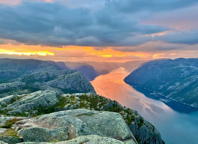 A mountainous landscape with a river flowing through a valley. 4