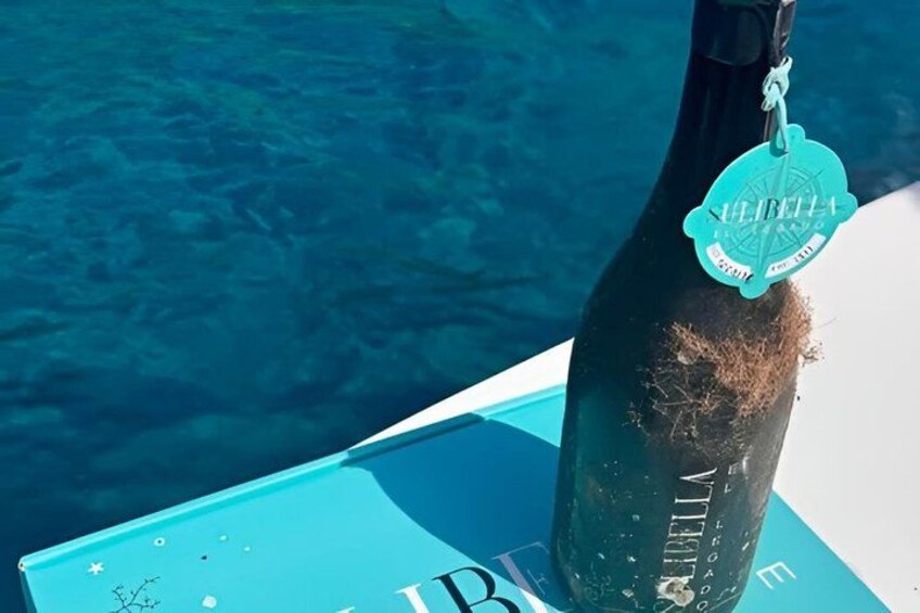 A bottle with a tag on a boat. 2