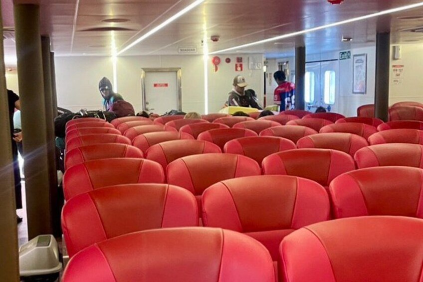 Rows of red seats in a waiting area. 3