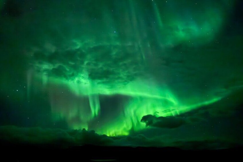 The aurora borealis over a snowy landscape. 2