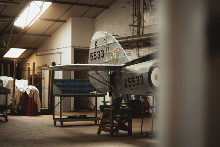An aircraft with the registration number K5533 in a hangar. 2