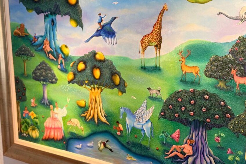 A vibrant mural with trees, animals, and people in a whimsical landscape. 2