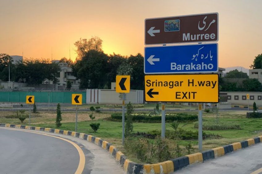 A road sign with directions to Murree, Barakaho, and Srinagar H.way EXIT. 3