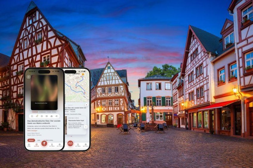 A cobblestone street lined with traditional half-timbered buildings, a smartphone displaying a map, and a sunset sky. 1