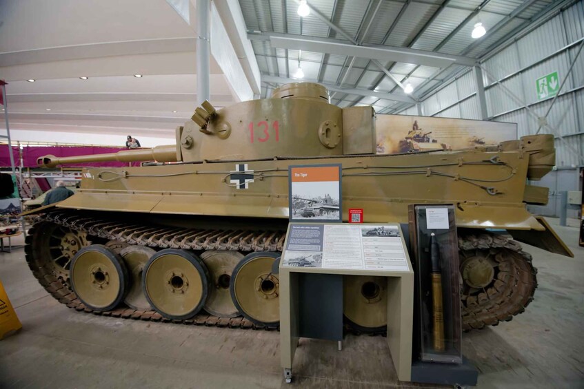 A military tank with tracks, a turret, and the number 131 on its side. 2