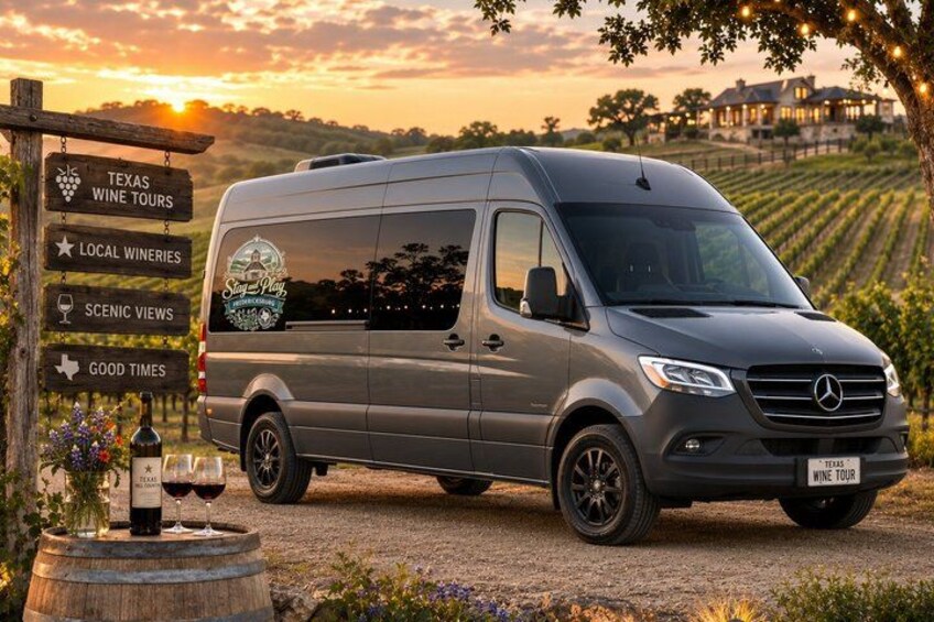 A Mercedes van parked in a vineyard with a sign indicating wine tours, local wineries, scenic views, and good times. 2