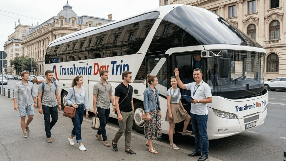 A group of people boarding a bus with 'Transilvania Day Trip' written on it. 5