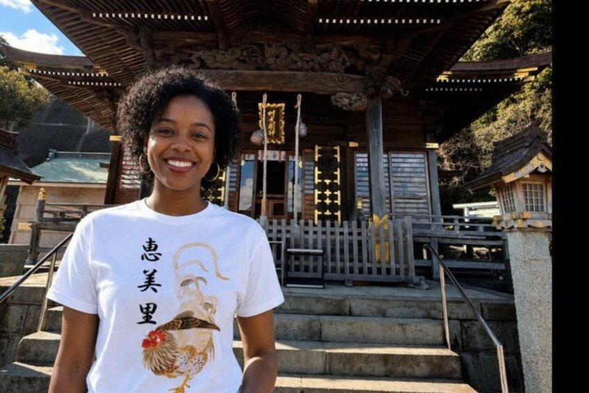 A person standing in front of a traditional Japanese building with a wooden structure and steps. 5