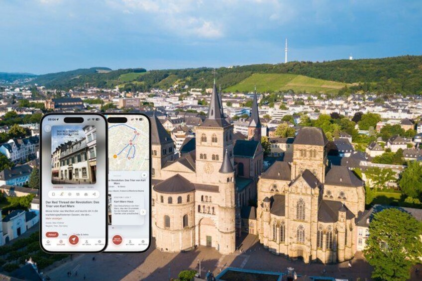 A cathedral and a smartphone displaying a map. 1