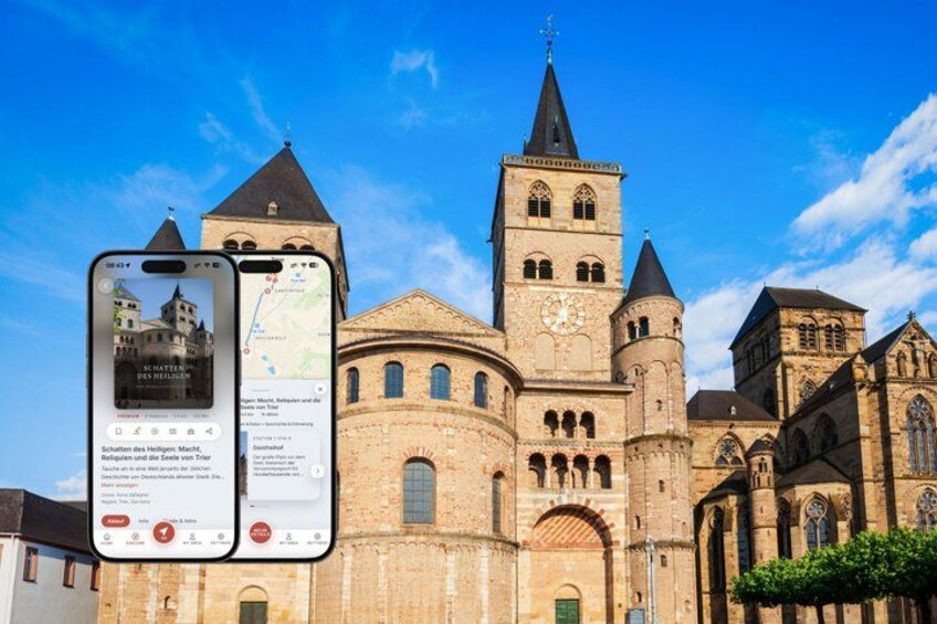 A historic church with a tall bell tower and a smartphone displaying a map. 1