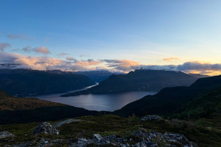 A mountainous landscape with a lake and a winding river. 4