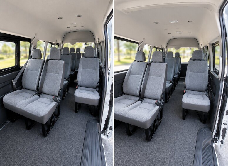 A vehicle interior with grey seats and a carpeted floor. 5
