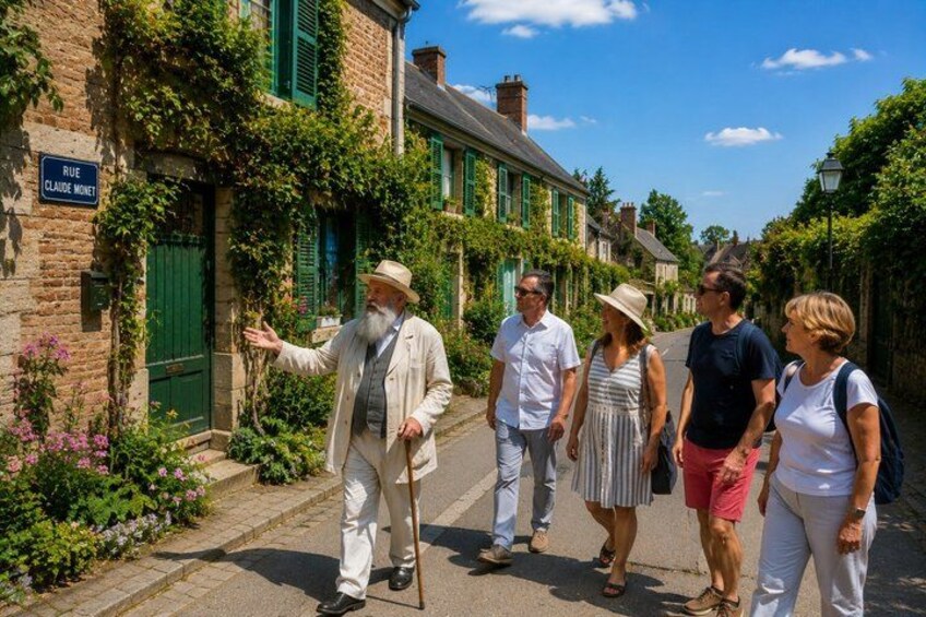 A group of people walking on a street with buildings covered in greenery. 4