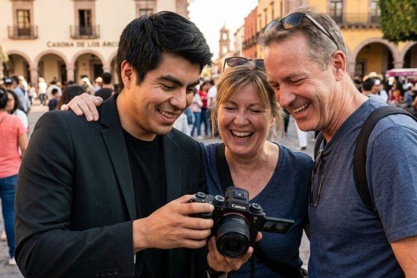 Three people, one holding a camera, standing in a crowded outdoor area with historic architecture in the background. 4