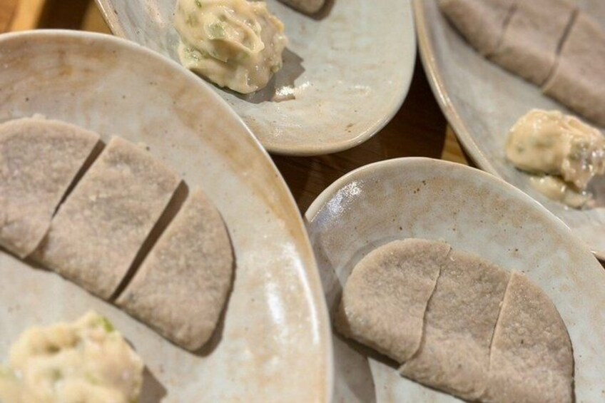 A collection of flatbreads on ceramic plates. 5
