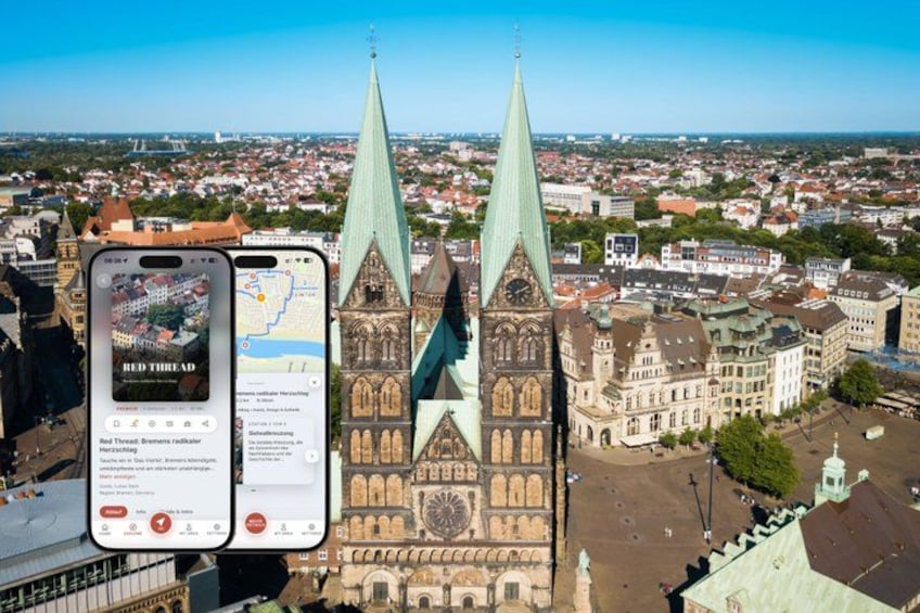 A cityscape with a prominent church featuring two tall spires, a clock tower, and a detailed facade. 1