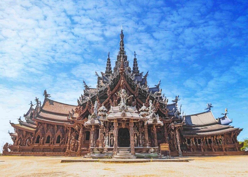 A traditional Thai temple with ornate architecture and intricate sculptures. 5
