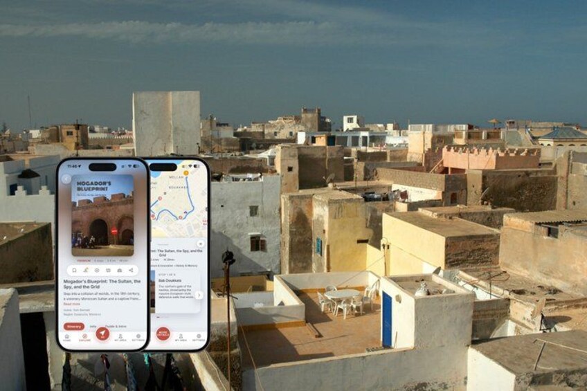A smartphone displaying a map and a historical site, with a view of a cityscape in the background. 1
