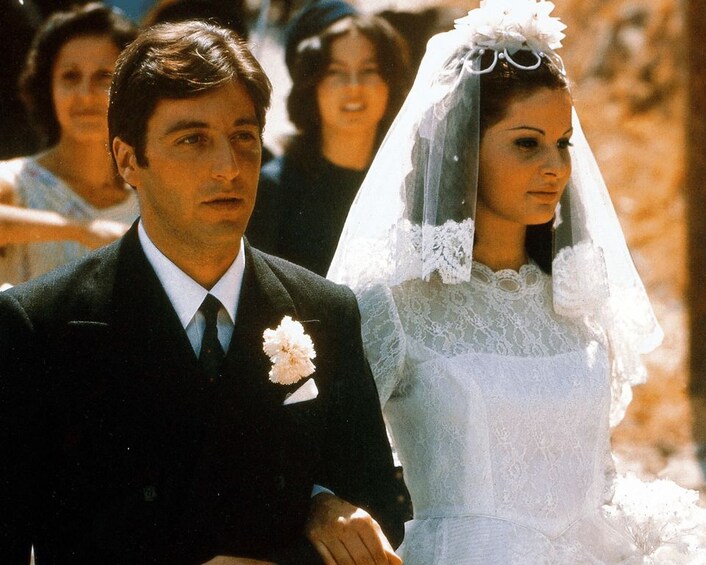 A bride and groom walking down the aisle. 3