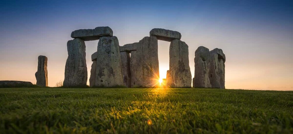 Stonehenge at sunset with the sun setting behind the structure. 1