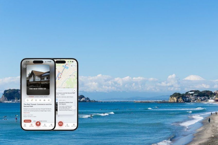 A smartphone displaying a map with a coastal scene, including a beach, ocean, and a mountain in the background. 1